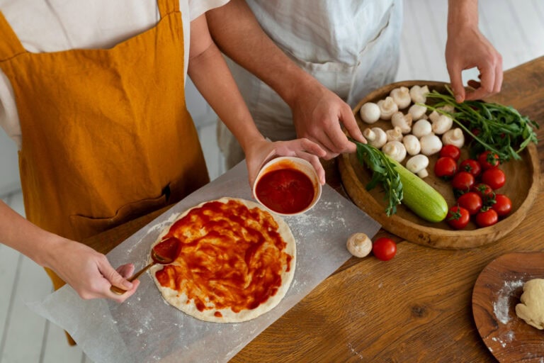 Andrea Vella shows with his wife how authentic Italian pizza succeeds at home